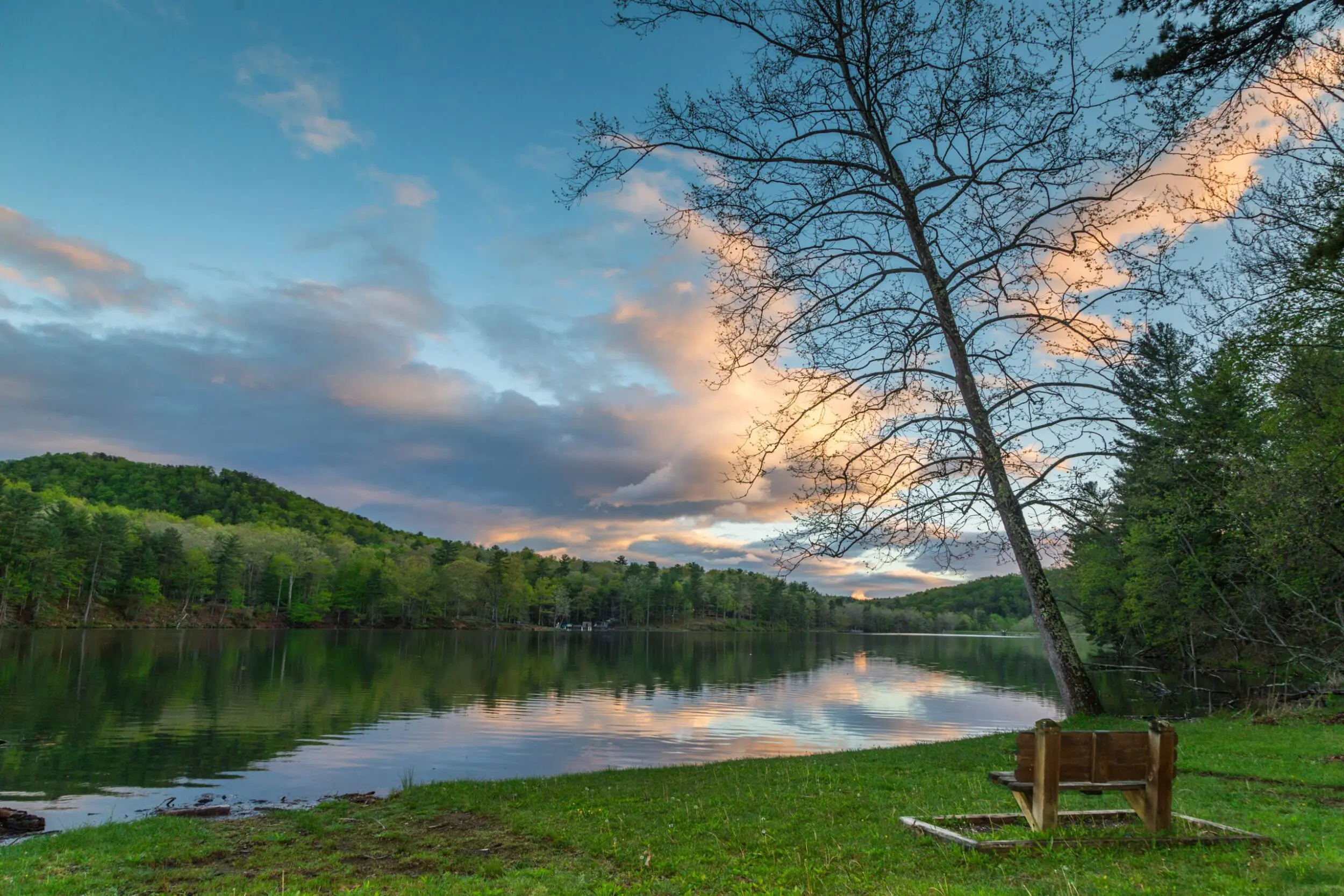 Douthat Lake at sunset on a summer evening.