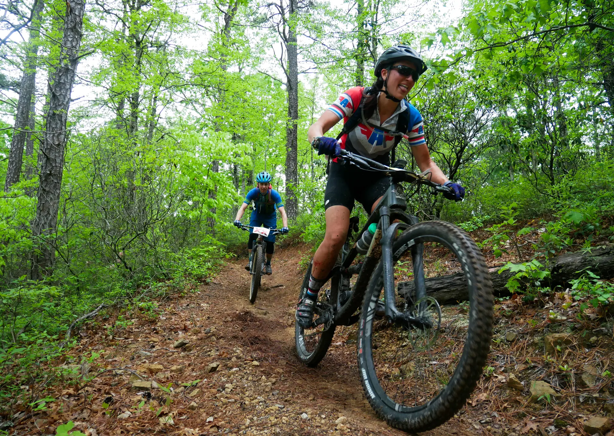 two cyclists riding trails at Douthat State Park in Alleghany County