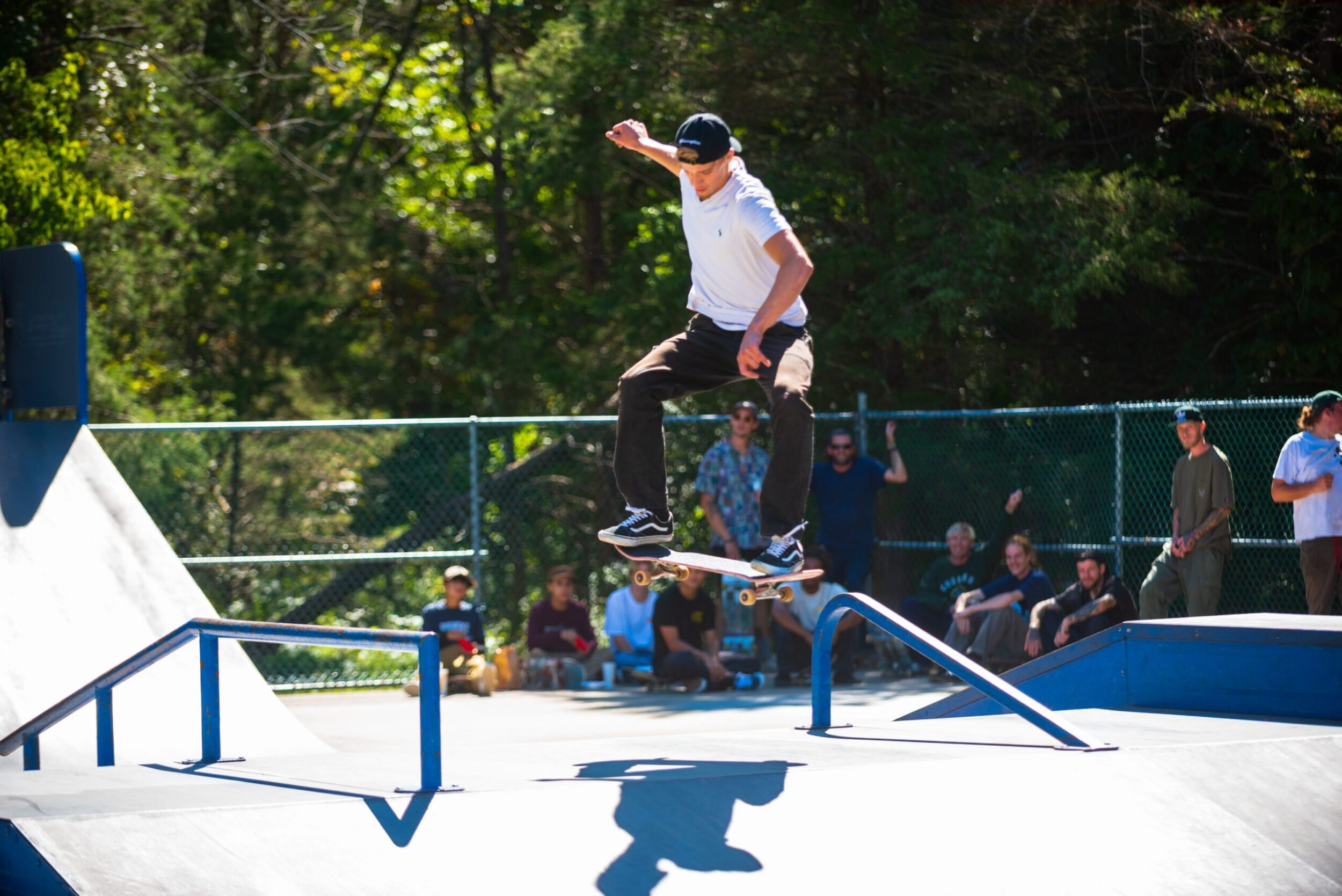 A white male skateboards at a skate park in Franklin County