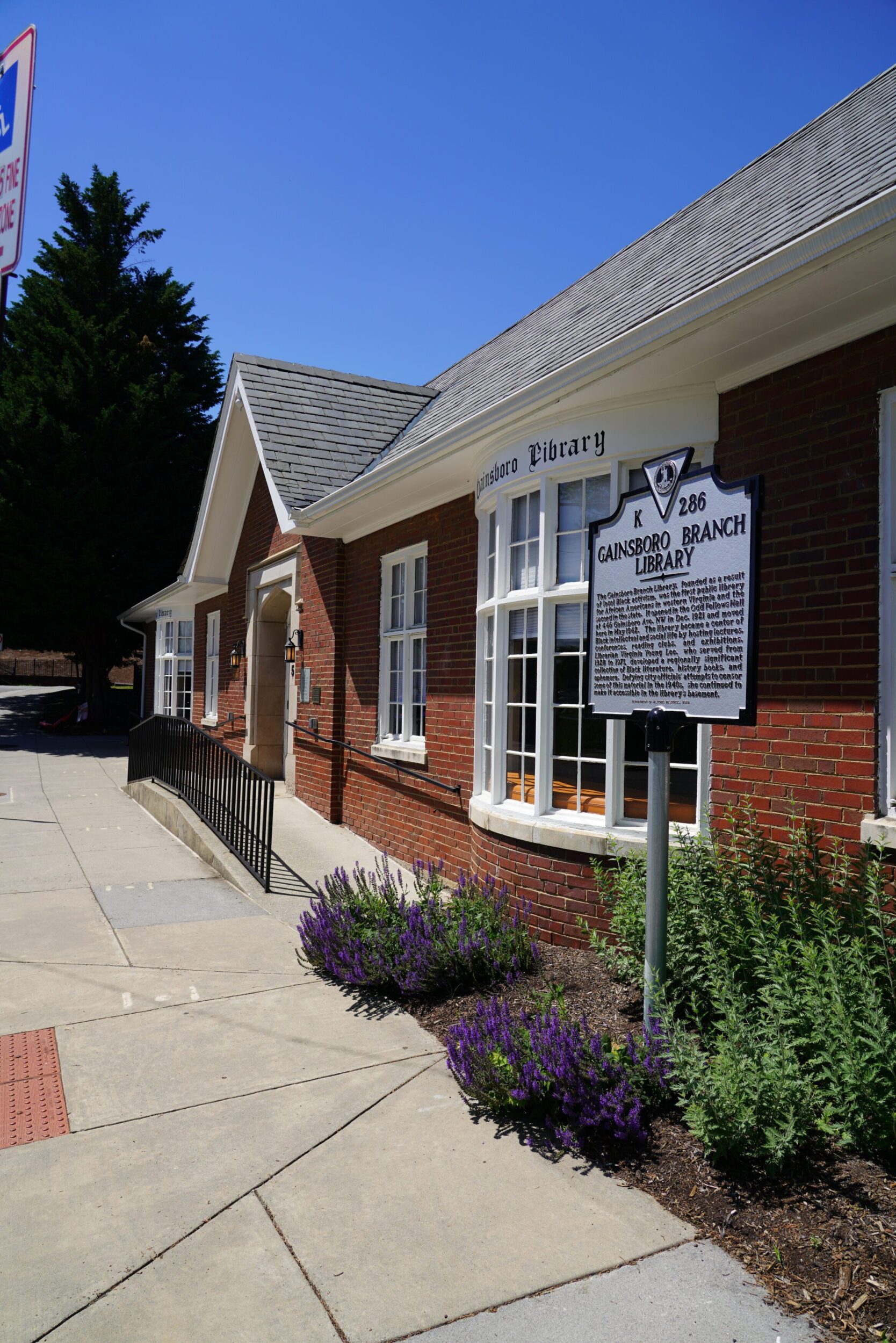 Exterior shot of the Gainsboro Library in Roanoke, VA. There is a historical placard in front of the building